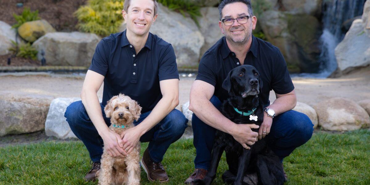 Dr. Mark Phillipe and Dr. Derek Hauser with our Beautiful Dental Therapy Dogs