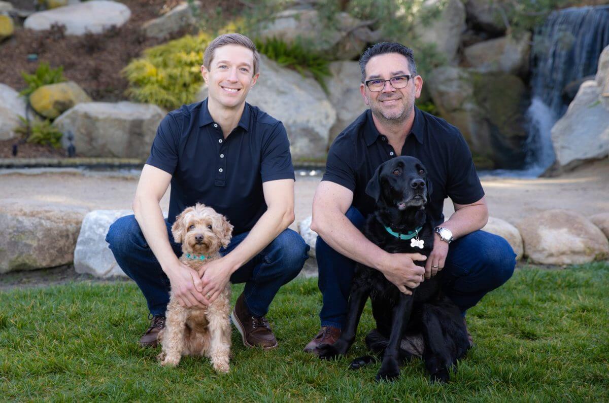 Dr. Mark Phillipe and Dr. Derek Hauser with our Beautiful Dental Therapy Dogs