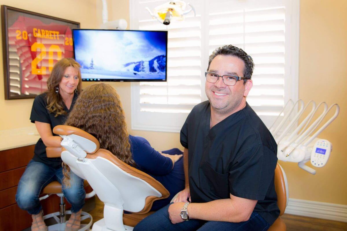 Dr. Hauser working with Dental Assistant Shannin